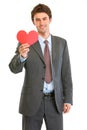 Smiling businessman with Valentin heart Royalty Free Stock Photo