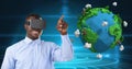 Smiling businessman wearing VR glasses by low poly earth