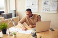 Smiling Businessman Working Office. Positive Guy Examining Documents