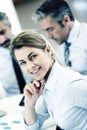 Smiling businesswoman attending meeting Royalty Free Stock Photo