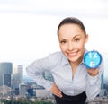 Smiling businesswoman with blue clock Royalty Free Stock Photo