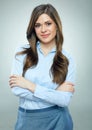 Smiling businesswoman blue shirt dressed standing on gray backgr Royalty Free Stock Photo