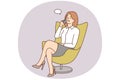 Smiling businesswoman in chair talking on cell