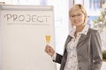 Smiling businesswoman with champagne Royalty Free Stock Photo