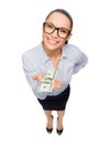 Smiling businesswoman with dollar cash money