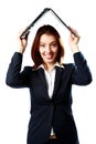 Smiling businesswoman holding a laptop above her head like a roof Royalty Free Stock Photo