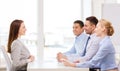 Smiling businesswoman at interview in office Royalty Free Stock Photo