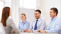 Smiling businesswoman at interview in office Royalty Free Stock Photo