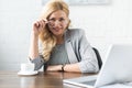 smiling businesswoman looking at camera Royalty Free Stock Photo