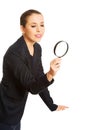 Smiling businesswoman with magnifying glass Royalty Free Stock Photo