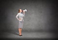 Smiling businesswoman with megaphone Royalty Free Stock Photo