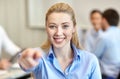 Smiling businesswoman pointing finger on you Royalty Free Stock Photo