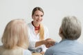 Smiling businesswoman shaking hand of senior hr at job interview Royalty Free Stock Photo