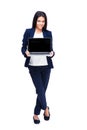 Smiling businesswoman showing blank laptop screen Royalty Free Stock Photo