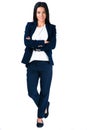 Smiling businesswoman standing with arms folded Royalty Free Stock Photo