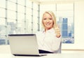 Smiling businesswoman or student with laptop Royalty Free Stock Photo