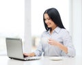 Smiling businesswoman or student with laptop Royalty Free Stock Photo