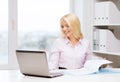 Smiling businesswoman or student with laptop Royalty Free Stock Photo