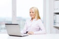 Smiling businesswoman or student with laptop Royalty Free Stock Photo