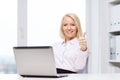 Smiling businesswoman or student with laptop Royalty Free Stock Photo