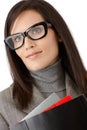 Smiling businesswoman in stylish glasses