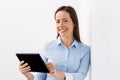 Smiling businesswoman with tablet pc computer Royalty Free Stock Photo