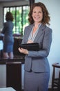 Smiling businesswoman taking notes Royalty Free Stock Photo