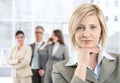 Smiling businesswoman with team