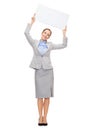 Smiling businesswoman with white blank board Royalty Free Stock Photo