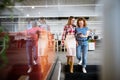 Smiling businesswomen talking and working together in bright office Royalty Free Stock Photo