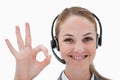 Smiling call center agent approving