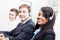 Smiling callcenter agent with headset support