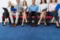 Smiling Candidates Wait For Job Interview, Mix Race Business People Sitting In Line Human Resources
