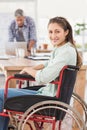 Smiling casual businesswoman in wheelchair Royalty Free Stock Photo