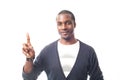 Smiling casual dressed black man gesturing with finger.