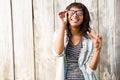 Smiling casual woman posing with glasses Royalty Free Stock Photo