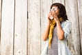 Smiling casual woman posing with glasses while drinking coffee Royalty Free Stock Photo