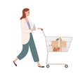 Smiling casual woman walking with shopping cart full of products vector flat illustration. Happy female hold bottle of Royalty Free Stock Photo