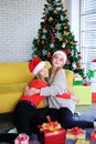 Smiling Caucasian couple sister is hugging together in Christmas party. Lifstyle of Teenage lesbian on holiday.