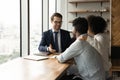 Male realtor have meeting with biracial couple clients Royalty Free Stock Photo