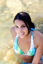 Smiling Caucasian Woman In Blue Bikini Sitting In River Royalty Free Stock Photo