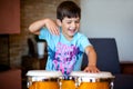 Boy playing drums with his hands. Royalty Free Stock Photo