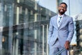 Smiling cheerful successful African American CEO businessman in stylish modern suit, happy warm distinguished portrait Royalty Free Stock Photo