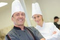 Smiling chef and commis chef Royalty Free Stock Photo