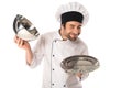 Smiling chef smelling money on tray