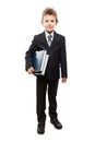 Smiling child boy in business suit holding books Royalty Free Stock Photo