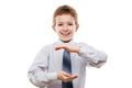Smiling child boy hand holding invisible sphere or globe Royalty Free Stock Photo