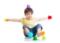 Smiling child boy having fun with color toys Royalty Free Stock Photo