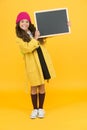 Smiling child craving for education. retro and modern school. just look here. stylish schoolgirl blackboard. copy space