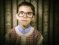 Smiling child with glasses in vintage clothes Royalty Free Stock Photo